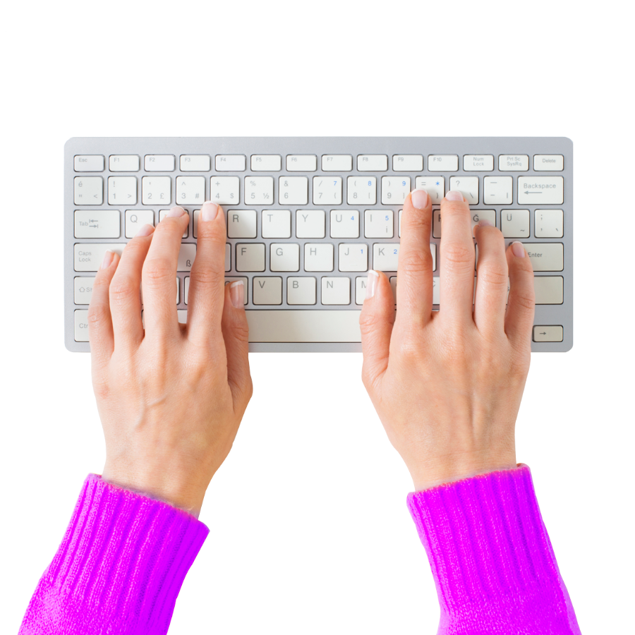 Human typing on a keyboard to represent SEO research